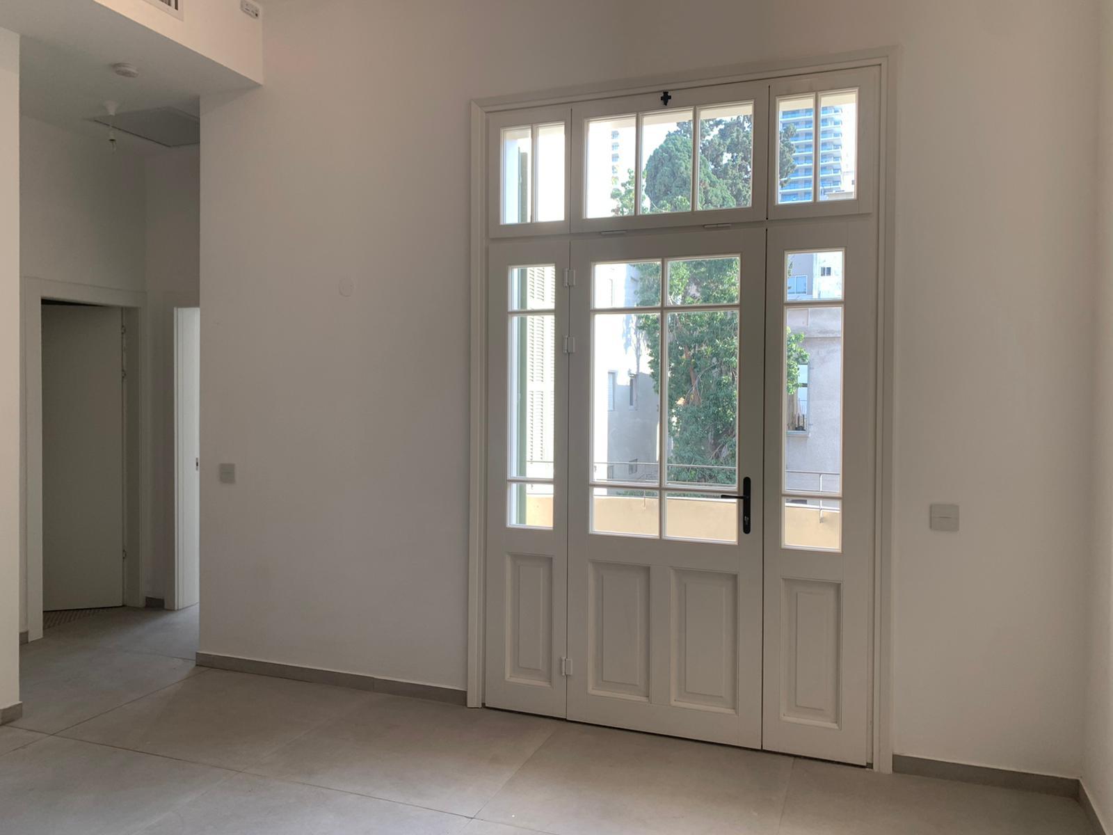 Exceptional Apartment in a Renovated Preservation Building | Prime City Center Location