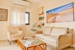 Stunning fully designed 2 bedroom apartment by the beach